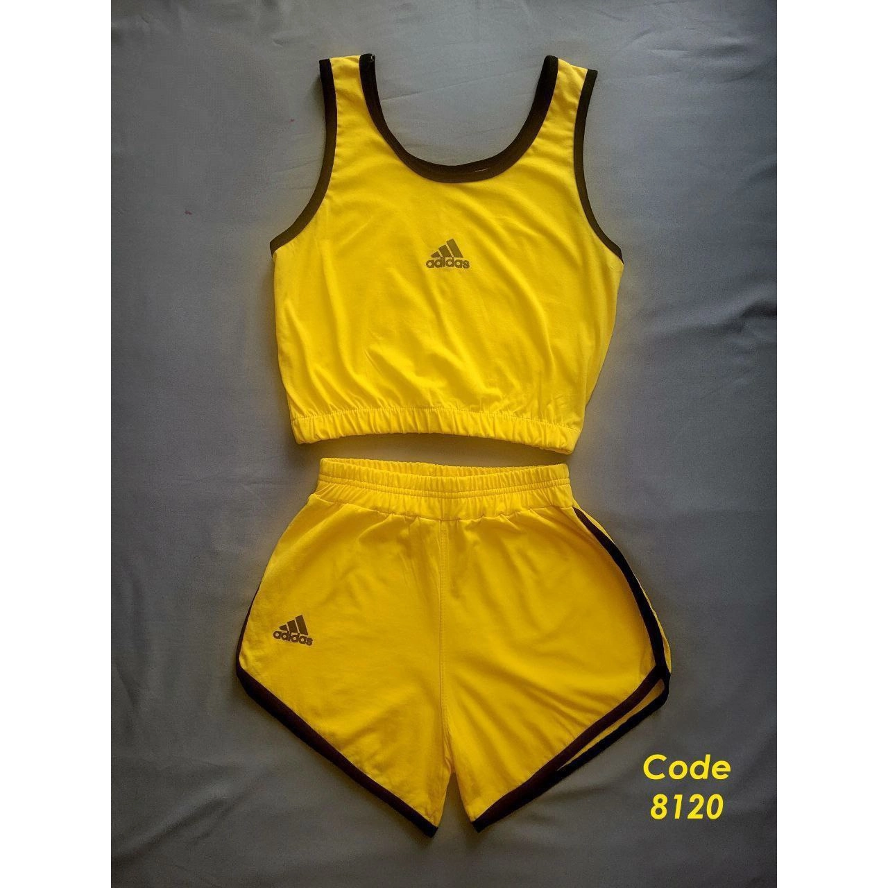 8120 ست کراپ نیمتنه شورتک آدیداس پنبه عالی فری سایز 36 تا 42 تن شیک - مشکی